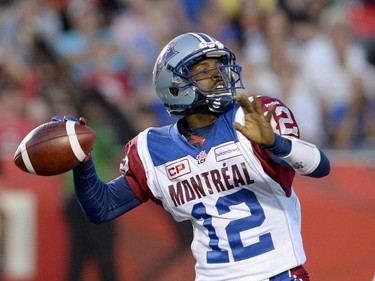 Montreal Alouettes quarterback Rakeem Cato (12) throws the ball against the Ottawa Redblacks during the first half of a CFL game in Ottawa on Friday, Aug. 7, 2015.