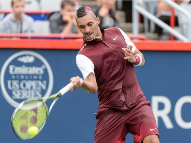 Nick Kyrgios of Australia returns the ball to Fernando Verdasco of Spain during day two of the Rogers Cup at Uniprix Stadium on August 11, 2015 in Montreal, Quebec, Canada.  Nick Kyrgios defeated Fernando Verdasco 6-3, 4-6, 6-4.
