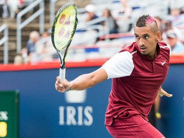Nick Kyrgios of Australia returns the ball to Fernando Verdasco of Spain during day two of the Rogers Cup at Uniprix Stadium on August 11, 2015 in Montreal, Quebec, Canada.