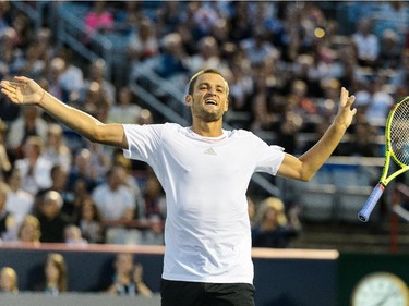 Mikhail Youzhny of Russia reacts after scoring a point against Rafael Nadal of Spain during day four of the Rogers Cup at Uniprix Stadium on August 13, 2015 in Montreal, Quebec, Canada.  Rafael Nadal defeated Mikhail Youzhny 6-3, 6-3.
