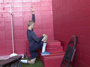 Lars Eller stretches out during the physical training on Sept. 17, 2015.