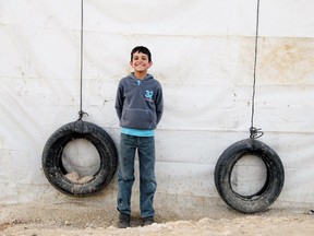 A boy in a Syrian refugee camp in Lebanon's Bekaa Valley, from Soup for Syria: Recipes to Celebrate Our Shared Humanity, a new cookbook to support food relief efforts for Syrian refugees.