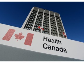 A sign is displayed in front of Health Canada headquarters in Ottawa.