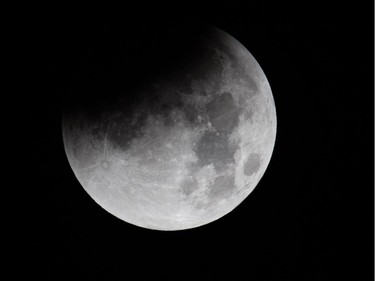 The partial eclipse of the moon begins on Sept. 28, 2015 in Somerset, England.