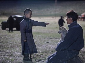 French director Jean-Jacques Annaud's Wolf Totem tells the quirky love story between a Chinese student (played by Feng Shaofeng, right) and a wolf cub, set in the backdrop of Inner Mongolia.
