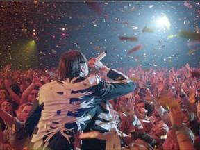 For The Reflektor Tapes, director Kahlil Joseph chopped up footage from Arcade Fire's latest tour and interspersed it with other imagery.