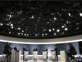 Bloc Quebecois Leader Gilles Duceppe, Conservative Leader and Prime Minister Stephen Harper, New Democratic Party Leader Thomas Mulcair, Green Party Leader Elizabeth May and Liberal Leader Justin Trudeau take part in the French-language debate in Montreal on Thursday, September 24, 2015.
