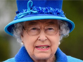 Britain's Queen Elizabeth II gives an address at Tweedbank Station on the Scottish Borders on Sept. 9, 2015.