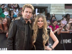 Chad Kroeger and Avril Lavigne, seen shortly after their wedding in 2013, have split up.