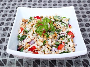 Red bell peppers and red onions liven up this Mediterranean salad.