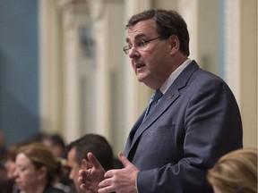 Quebec Education Minister François Blais rises during question period, Wednesday, May 27, 2015 at the legislature in Quebec City.