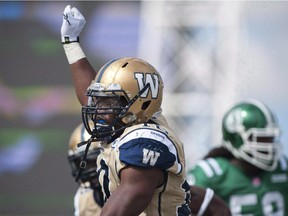Blue Bombers linebacker Henoc Muamba celebrates a tackle during a game in 2013. The Alouettes have agreed to terms with the free agent.