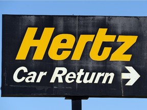 A sign at a Hertz Global Holdings car rental branch.