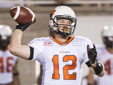 B.C. Lions' quarterback John Beck throws a pass against the Montreal Alouettes during first half CFL football action in Montreal on Thursday, September 3, 2015.