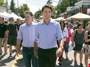 Justin Trudeau campaigned with Peter Schiefke, left, in Hudson, August 1, 2015.