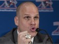 Mark Weightman speaks during a news conference in Montreal, Tuesday, December 3, 2013, where he was announced as the new President and CEO of the Montreal Alouettes CFL football club.