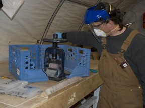 Uranium core samples are checked at Ressources Strateco mine at the at Matoush project site in northern Quebec.  Photo: Courtesy Ressources Strateco. (HAND OUT) -  (BUSINESS)