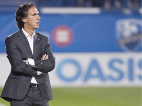 Montreal Impact head coach Mauro Biello looks on from the bench during MLS game against the Chicago Fire at Montreal's Saputo Stadium on Sept. 5, 2015.