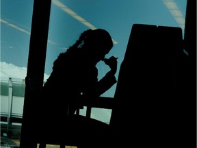 A student studies in the library.