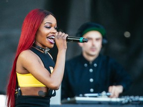 Azealia Banks, pictured at the ÎleSoniq festival last month, is trying to explain away her homophobic slur.