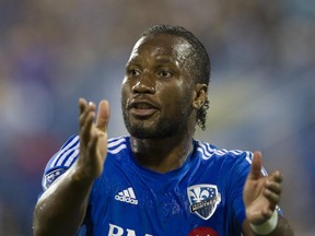 Didier Drogba claps his hands from the pitch in his debut for the Montreal Impact against the Philadelphia Union in MLS action at Saputo Stadium on Aug. 22, 2015.  (John Kenney / MONTREAL GAZETTE)
