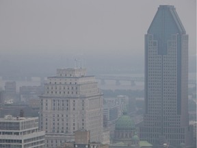 A view of Montreal including the Victoria bridge during a smog warning issued by Environment Canada taken from the Mount-Royal lookout.