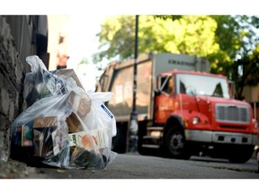 Plastic recycling bags line the streets in the Plateau.