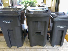 MONTREAL, QUE.: September 08, 2015 -- New garbage bins on display in the lobby of Beaconsfield City Hall west of Montreal Tuesday September 08, 2015.  The bins will be wired to give a digital reading of how much garbage is being picked up from what address.  (John Mahoney / MONTREAL GAZETTE)