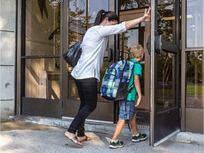 It's the first day of kindergarten for Jennifer Huxsel's 5-year-old son Fox Jordaan at St. John Fisher Elementary School in Pointe-Claire, on Tuesday, Sept. 1, 2015.