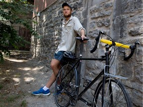 McGill student Alex Simakov with his bike in Montreal. Simakov used the bike to cycle 6,200 kilometres this summer, from Los Angeles to Oregon and across the U.S. to his home in Toronto to raise awareness of the Syrian refugee crisis and raise funds.