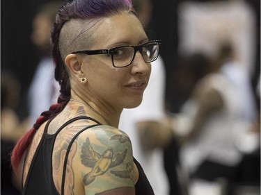 Josianne Labelle enjoys the art tattoo show held in Montreal on Friday September 11, 2015. The show at Place Bonaventure goes on through the weekend.