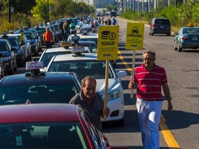 Taxi drivers protest against Uber in Montreal Sept.16, 2015.