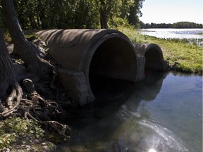 Water flows from a culvert in Montreal.