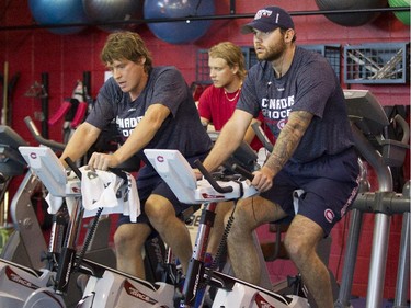 Montreal Canadiens forwards Alexander Semin (left) and Zack Kassian go through a physical test.