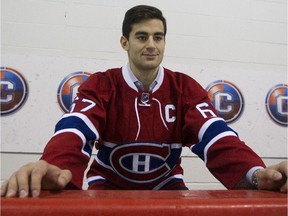 New Canadiens captain Max Pacioretty sits on the bench at the Bell Sports Complex in Brossard on Sept. 18, 2015.