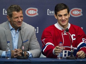 New Canadiens captain Max Pacioretty has a laugh with GM Marc Bergevin during news conference at the Bell Sports Complex in Brossard on Sept. 18, 2015.
