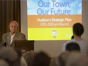 Hudson Mayor Ed Prévost listens as a resident asks a question concerning the towns long-awaited strategic plan, during a presentation by the town at the Stephen Shaar Community Centre in Hudson on Saturday, September 19, 2015. (Peter McCabe / MONTREAL GAZETTE)
