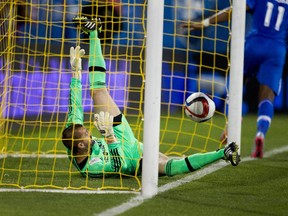 Chicago Fire goalkeeper Jon Busch fails to stop the ball as Montreal Impact forward Didier Drogba scores the opening goal during MLS action at Saputo Stadium in Montreal on Wednesday Sept. 23, 2015.