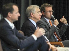 Conservative candidate Eric Girard, left, Liberal Francis Scarpaleggia and Ryan Young, right, of the NDP take part in a meeting with John Abbott College students and staff in Ste-Anne-de-Bellevue, Wednesday September 23, 2015.  The three are candidates in the upcoming federal election in the Lac-St-Louis riding.   (John Mahoney / MONTREAL GAZETTE)