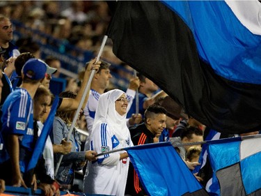 Montreal Impact fans cheer as the Impact play the Chicago Fire during MLS action at Saputo Stadium in Montreal on Wednesday September 23, 2015.