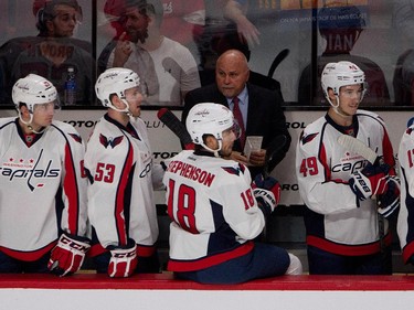 Washington Capitals head coach Barry Trotz watches as the team changes lines against the Montreal Canadiens during NHL pre-season action in Montreal on Thursday September 24, 2015.