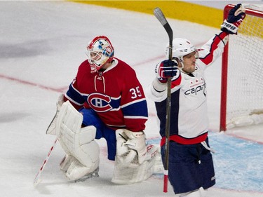 Capitals left-winger Alex Ovechkin celebrates T.J. Oshie's goal against  Canadiens goalie Dustin Tokarski, during pre-season action in Montreal on Thursday September 24, 2015.