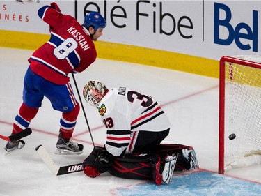 Montreal Canadiens right wing Zack Kassian scores against Chicago Blackhawks goalie Scott Darling during NHL pre-season action in Montreal on Friday September 25, 2015.