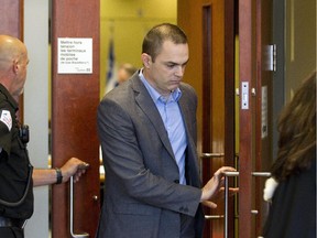 Former cardiologist Guy Turcotte leaves a courtroom at the St.  Jerome courthouse in St.  Jérôme, Tuesday September 29, 2015.