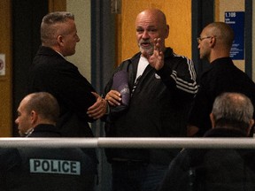 Sergio Piccirilli, centre, leaves the Laval courthouse on Sept. 29, 2015 after his trial was moved to Nov. 13, 2015. He was found guilty on Jan. 28, 2016 on 23 charges he faced in Project Cleopatra, an RCMP investigation into drug trafficking.