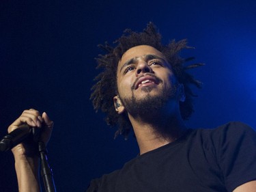 Hip-hop artist J. Cole looks out at the crowd at the Bell Centre in Montreal Friday, September 4, 2015. His most recent studio album is 2014 Forest Hills Drive.