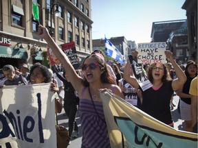 Hundreds of Montrealers gathered downtown on Saturday Sept.r 5, 2015,  to protest against Canada's refuge policy, and calling for Canada to accept 10,000 refugees immediately.