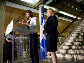Immigration Minister Kathleen Weil, left,  and International Relations Minister Christine St-Pierre announces measures the Quebec government will put in place to deal with the Syrian refugee crisis, Sept. 7, 2015, in Montreal.