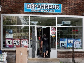A client enters Depanneur Esposito in Montreal on Wednesday September 9, 2015. The depanneur was robbed last year by a teenager who had been radicalized and is now being tried on terror related charges.