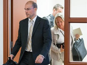 Brahim Soussi, RCMP detective in the case of a West Island teenager facing terrorism charges, leaves a meeting room during a break in court at the Montreal Youth Court in Montreal on Wednesday, September 9, 2015.